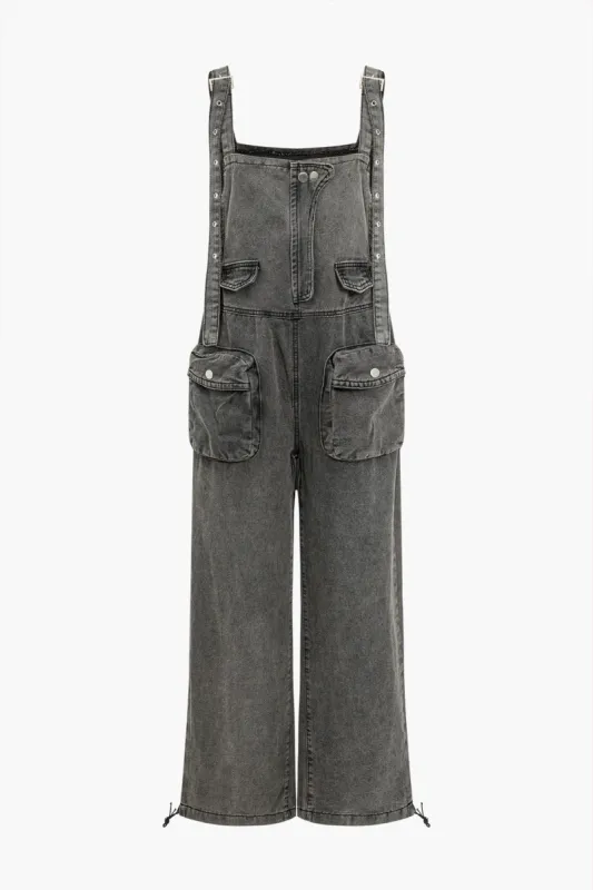 Solid knaplomme denim jumpsuit sold by Micas