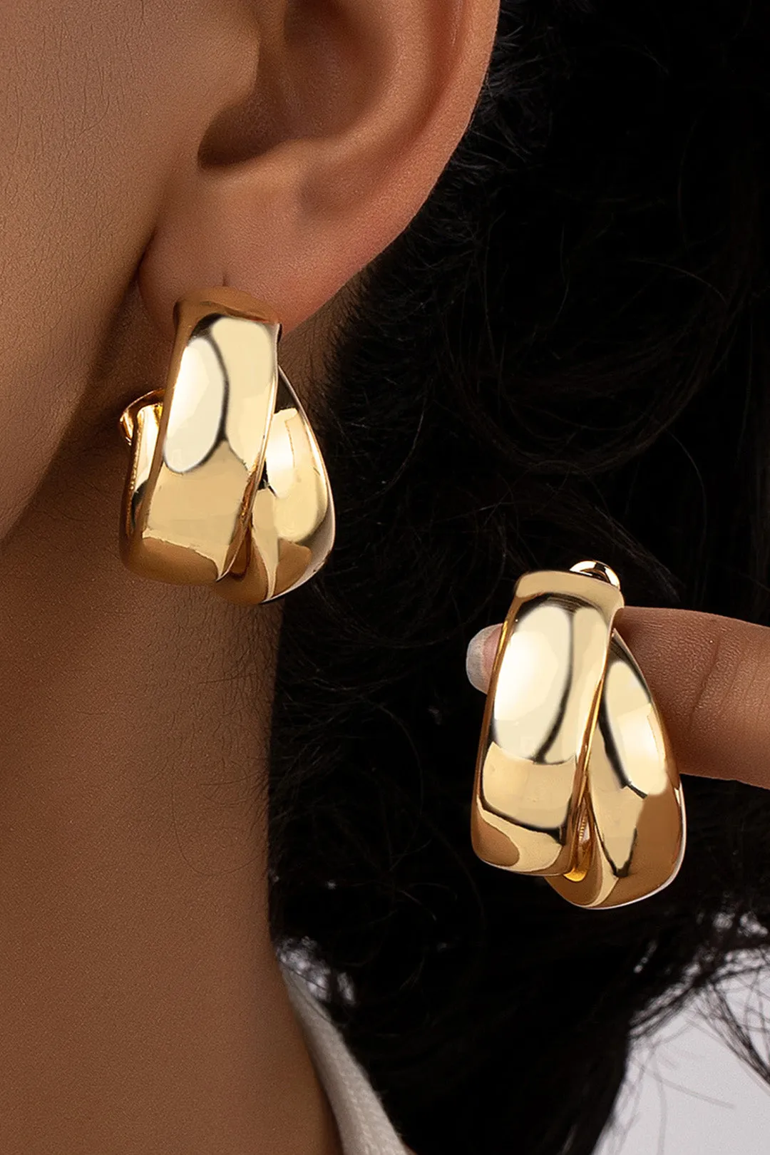 Legerede geometriske cirkeløreringe sold by Micas