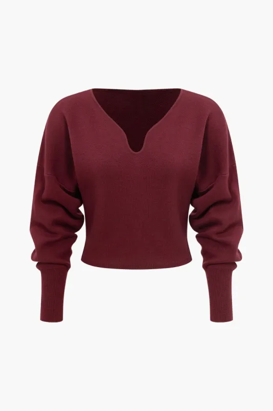 Basic solid strik langærmet top sold by Micas