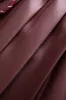 Solid Faux Leather Pleated High Waist Tie-Up Skirt sold by Micas