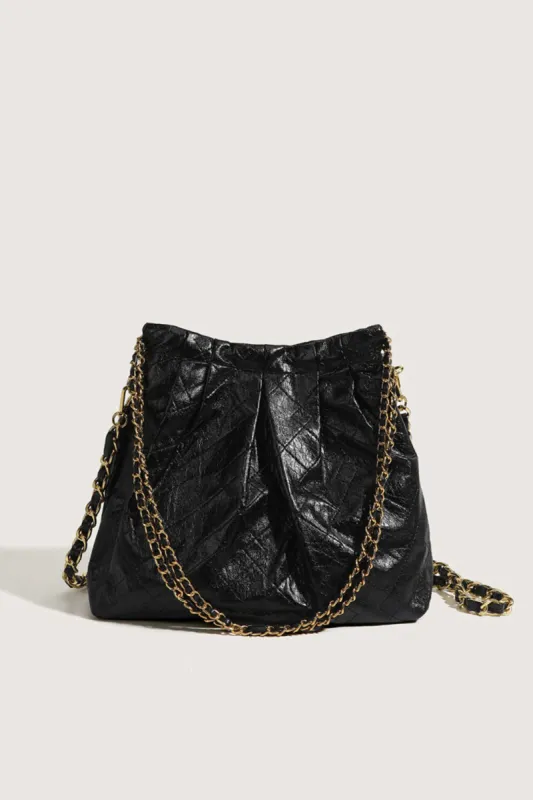 Diamond Grid Chain Cross-Body Bag sold by Micas