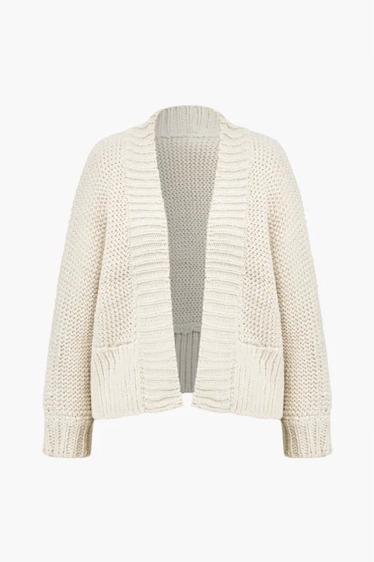 Basic solid sweater cardigan sold by Micas