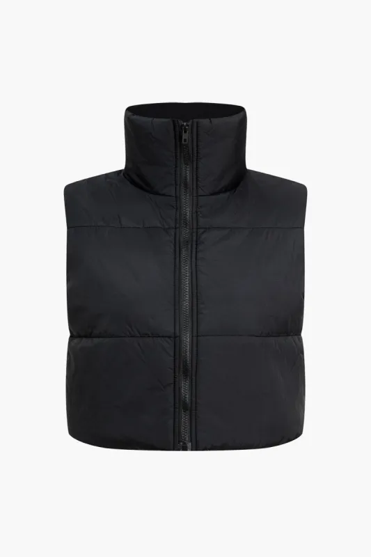 Turtleneck Zip-Up Puffer Vest sold by Micas