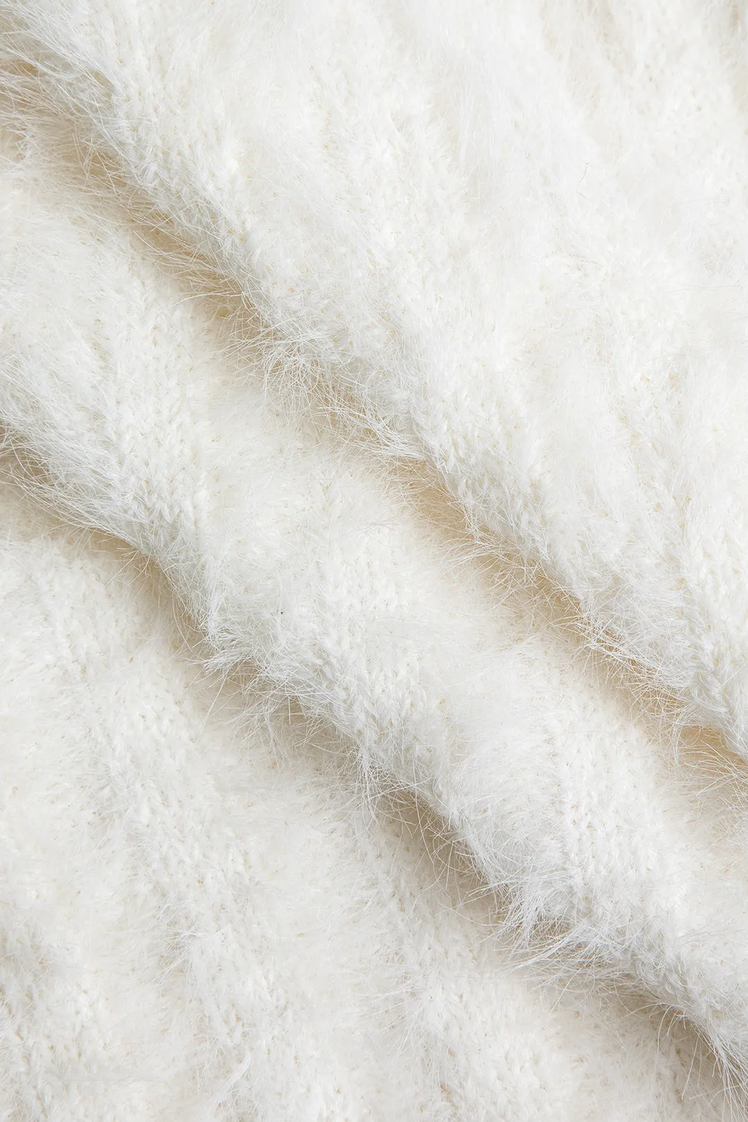 Asymmetrisk fuzzy strikjakke med lynlås sold by Micas product image thumbnail 3