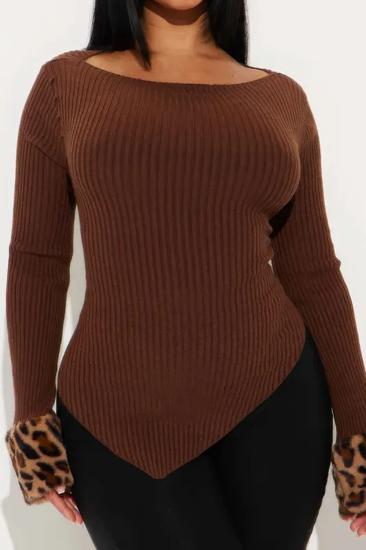 Plus Size Ribbed Asymmetrical Hem Sweater With Leopard Cuffs sold by Micas
