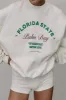 Brevprint rund hals sweatshirt sold by Micas
