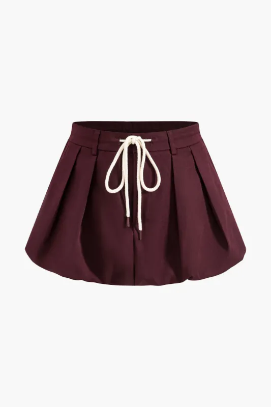 Drawstring mini nederdel sold by Micas