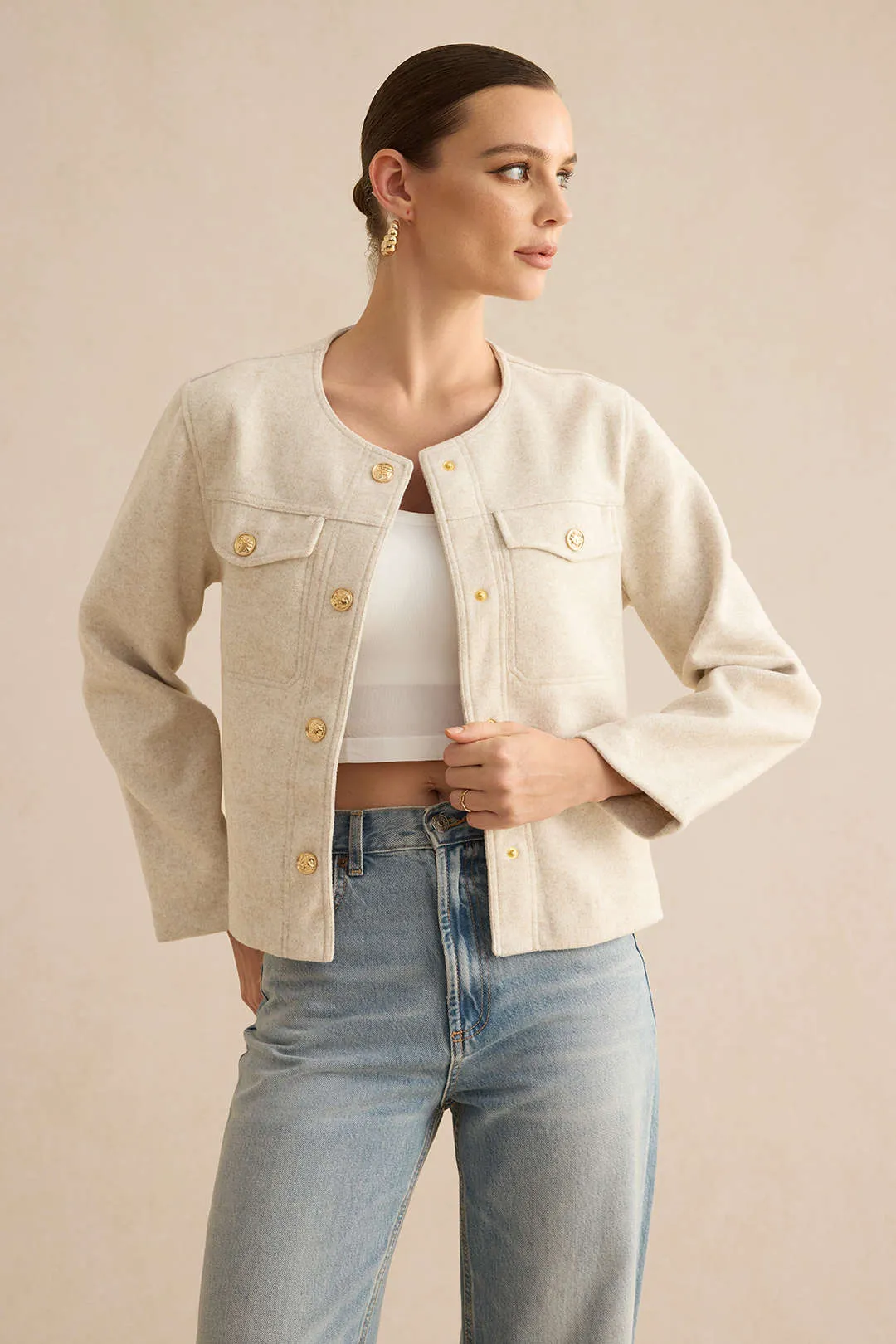 Button And Pocket Metallic Jacket sold by Micas