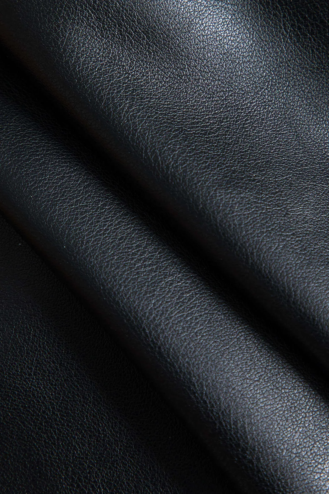 Plus størrelse faux læder slips front patchwork nederdel sold by Micas product image thumbnail 3