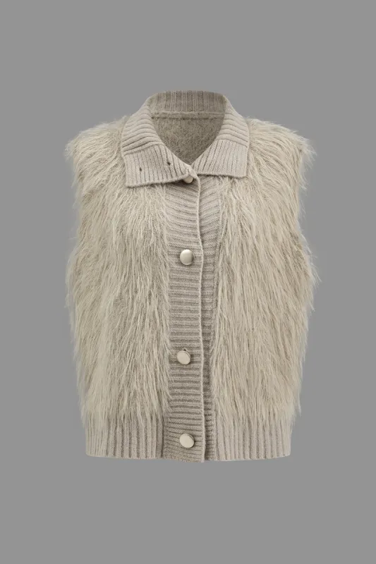 Faux pels strikket vest sold by Micas