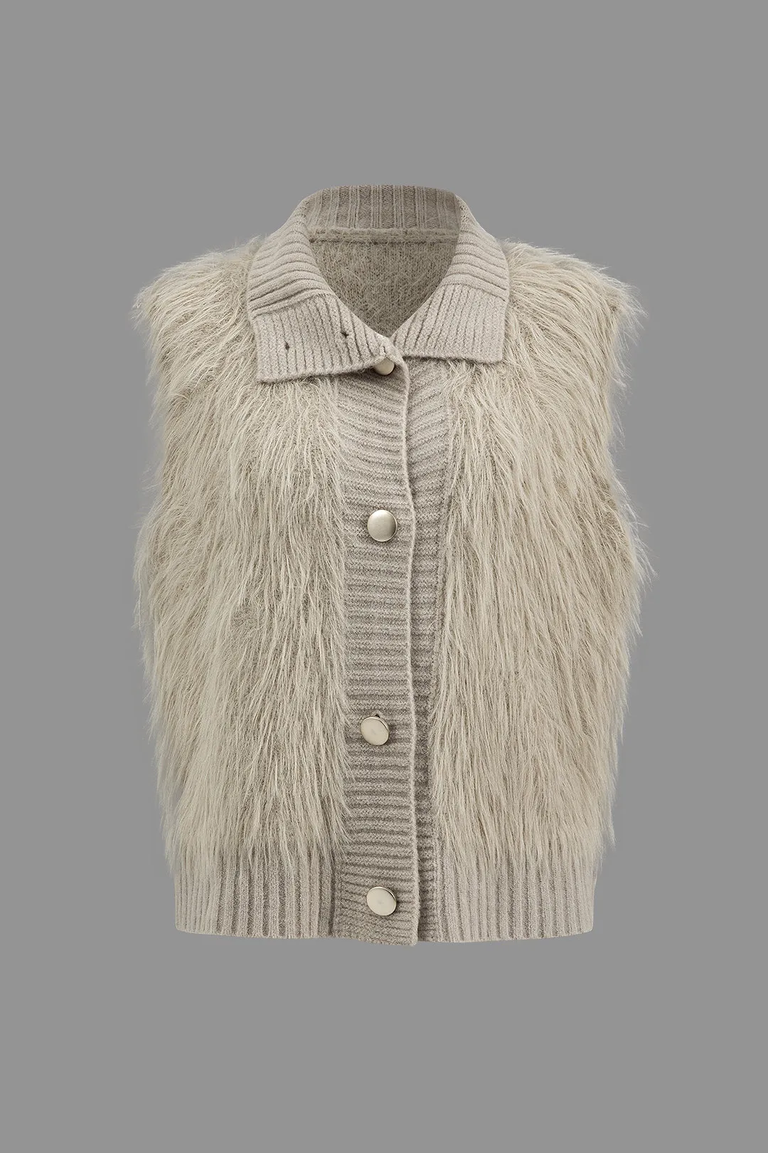 Faux pels strikket vest sold by Micas