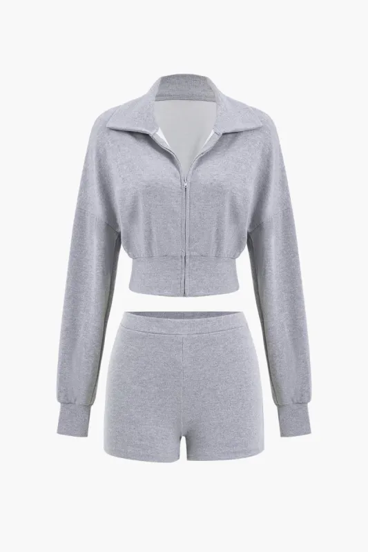 Beskåret lynlås top og shorts sæt sold by Micas