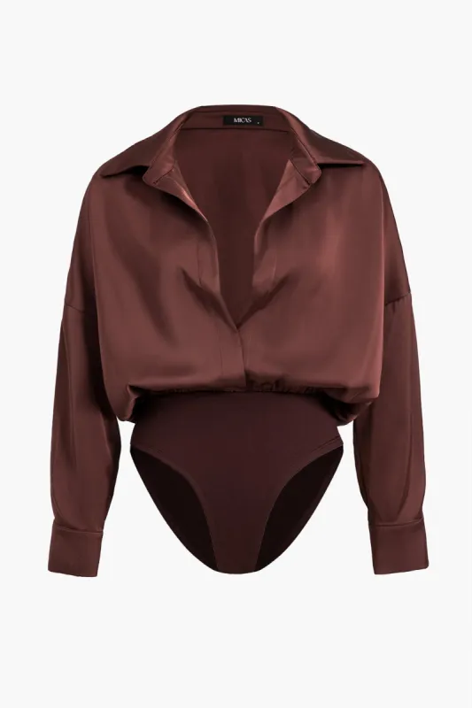 Plus størrelse satin patchwork langærmet bodysuit sold by Micas