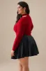 Plus Size strik asymmetrisk langærmet top sold by Micas