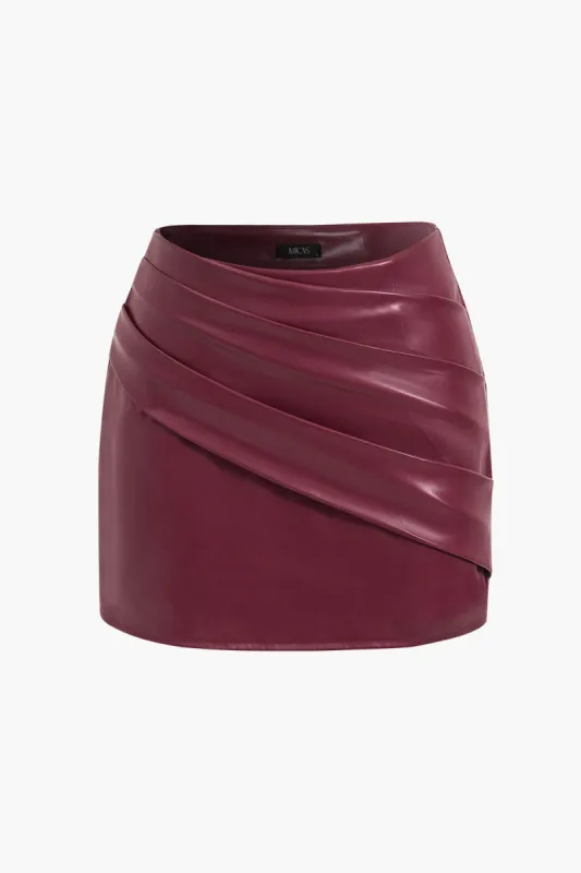 Faux læder asymmetrisk ruched nederdel sold by Micas