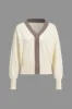Kontrastknap sweater cardigan sold by Micas