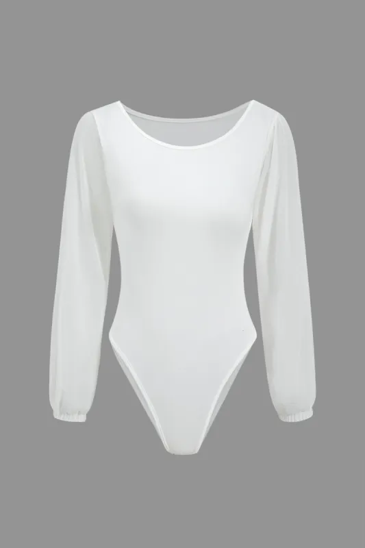 Solid langærmet bodysuit sold by Micas