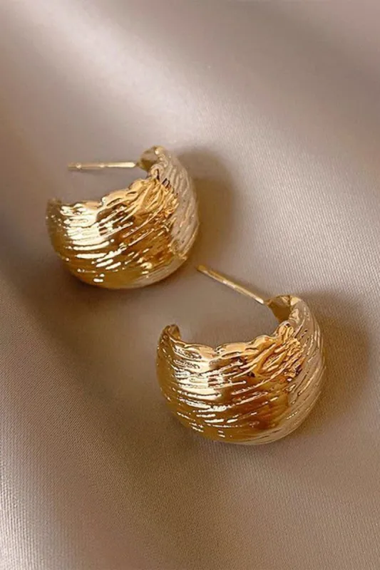 Metal Earrings sold by Micas