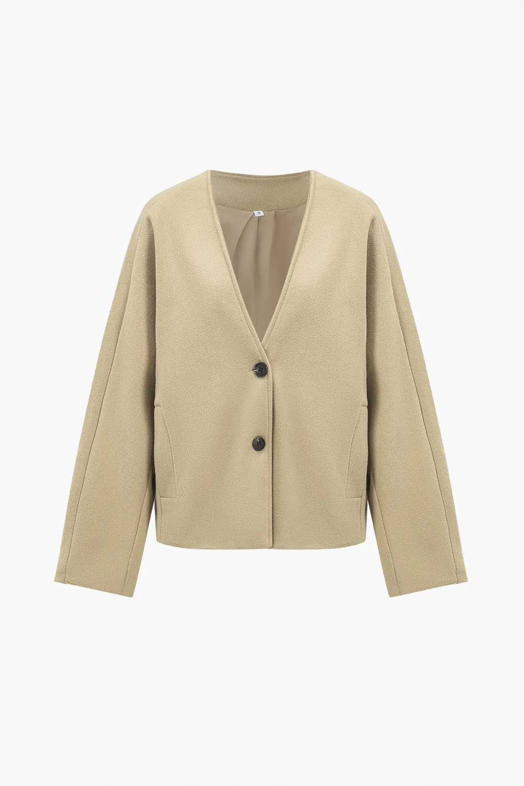 Strik knap V-hals cardigan sold by Micas