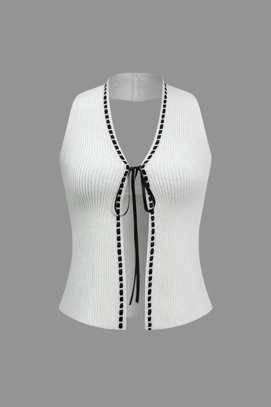 Strik kontrastbindingsvest sold by Micas