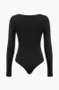 Langærmet lynlås front bodysuit sold by Micas