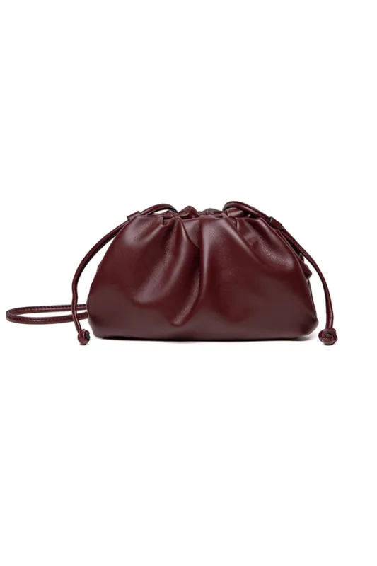 Cloud-Inspired Clutch Bag sold by Micas