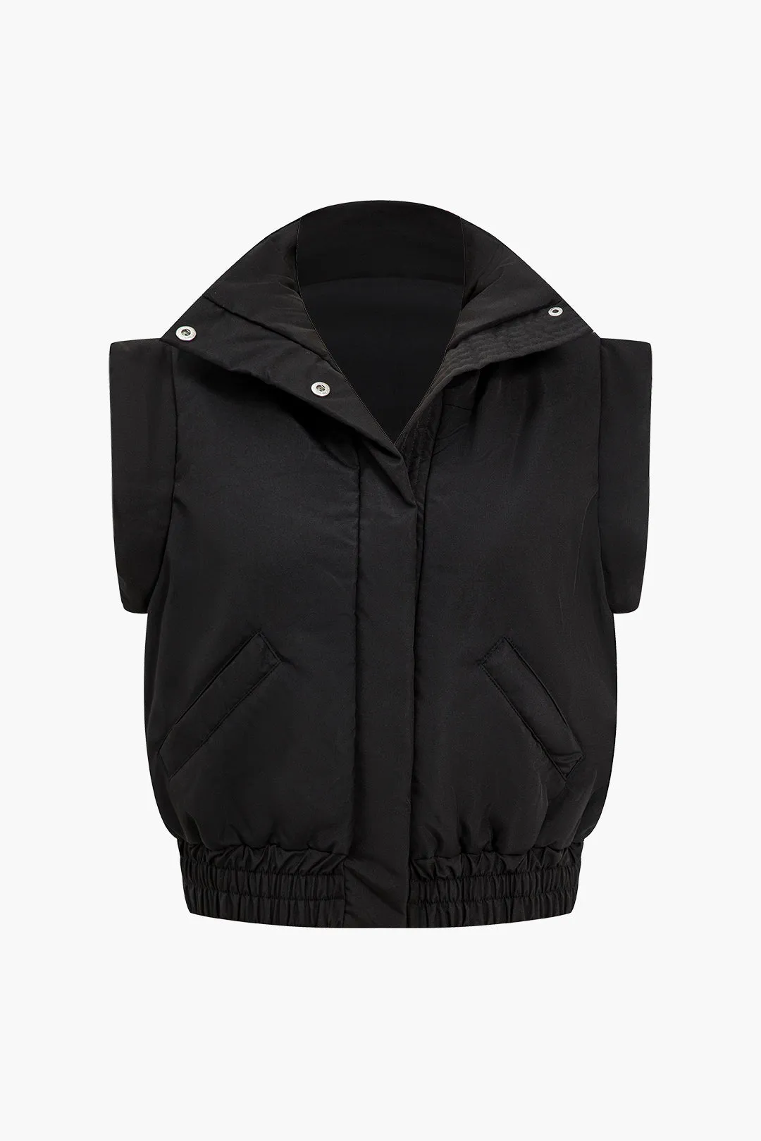 Knapdetaljer polstret vest sold by Micas