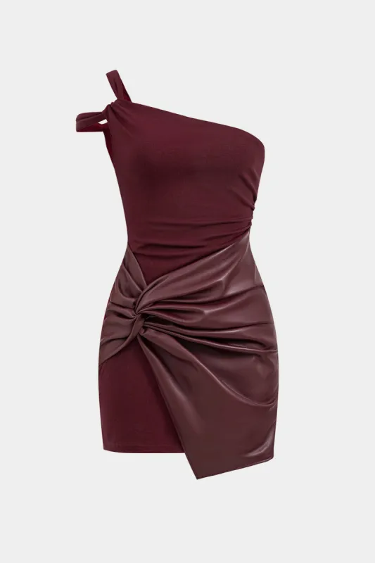 Faux læder patchwork mini kjole sold by Micas