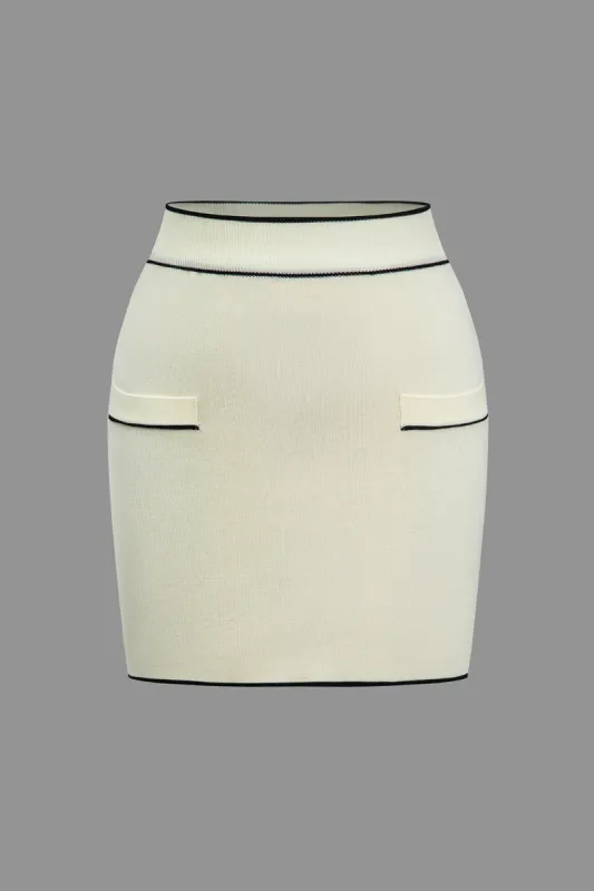 Strik farveblok lomme nederdel sold by Micas