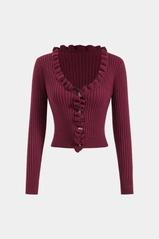 Strikket knap langærmet top sold by Micas