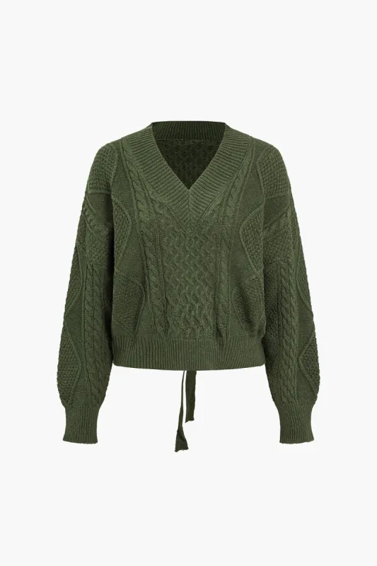 Strik stroppet bagbind langærmet top sold by Micas