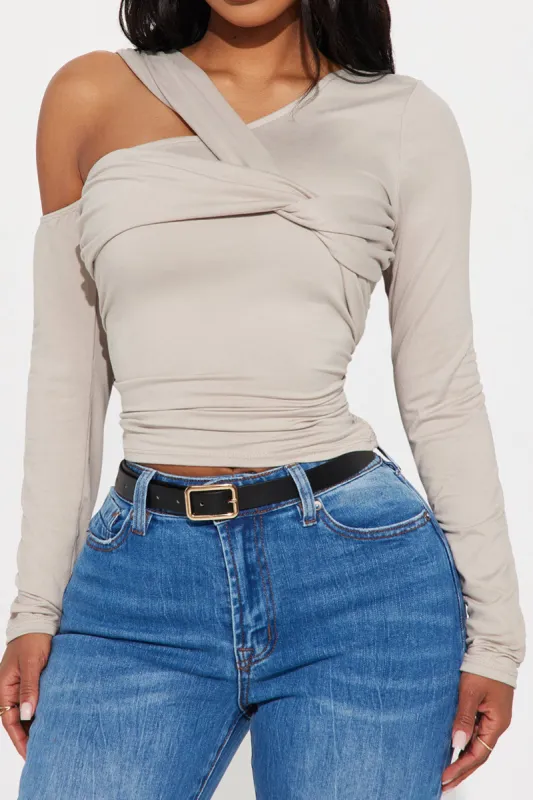 Knitted Cut Out Asymmetrical Neck Long-Sleeve Top sold by Micas