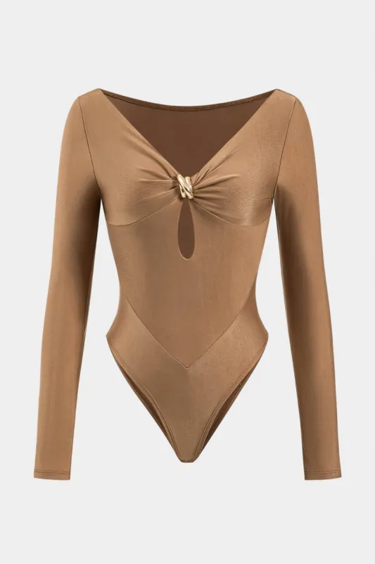 Klip ud af langærmet bodysuit sold by Micas