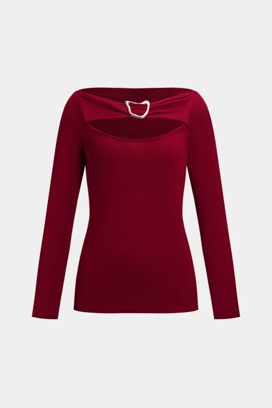 Metallisk skåret ud bagfra langærmet top sold by Micas