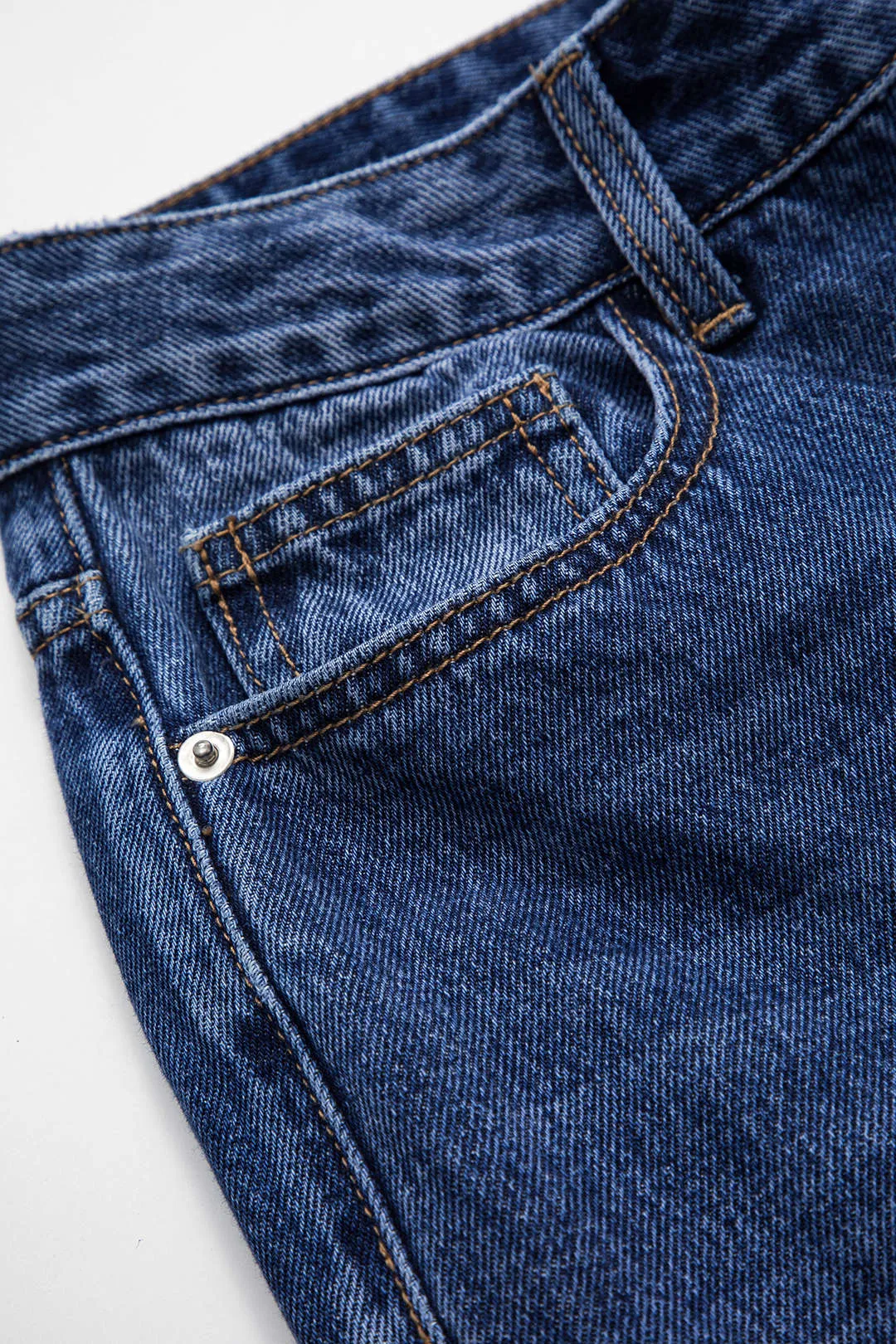 Denim patchwork -knaplomme bælte jeans sold by Micas product image thumbnail 3