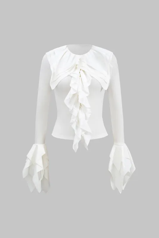Faux læder ruffle langærmet top sold by Micas