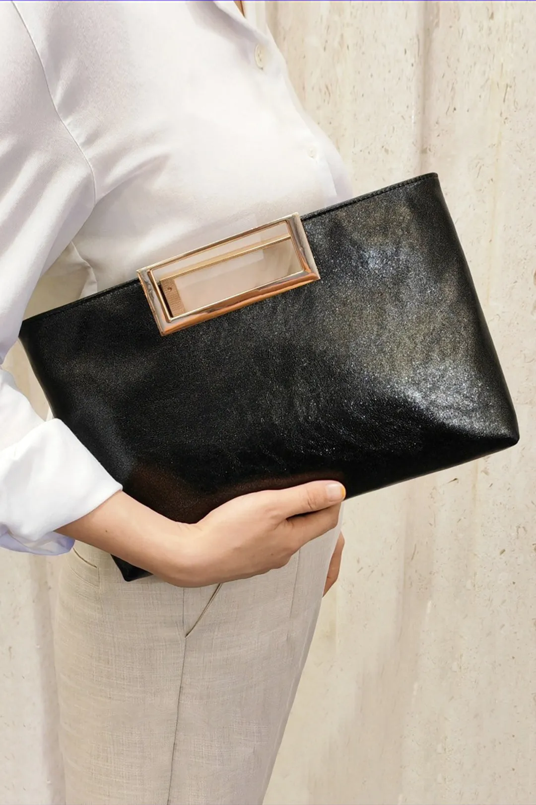 Faux Leather Clutch Bag sold by Micas
