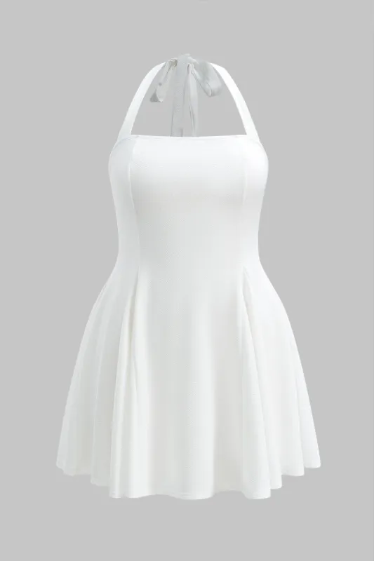 Plus størrelse plisset rygfri slips tilbage mini kjole sold by Micas