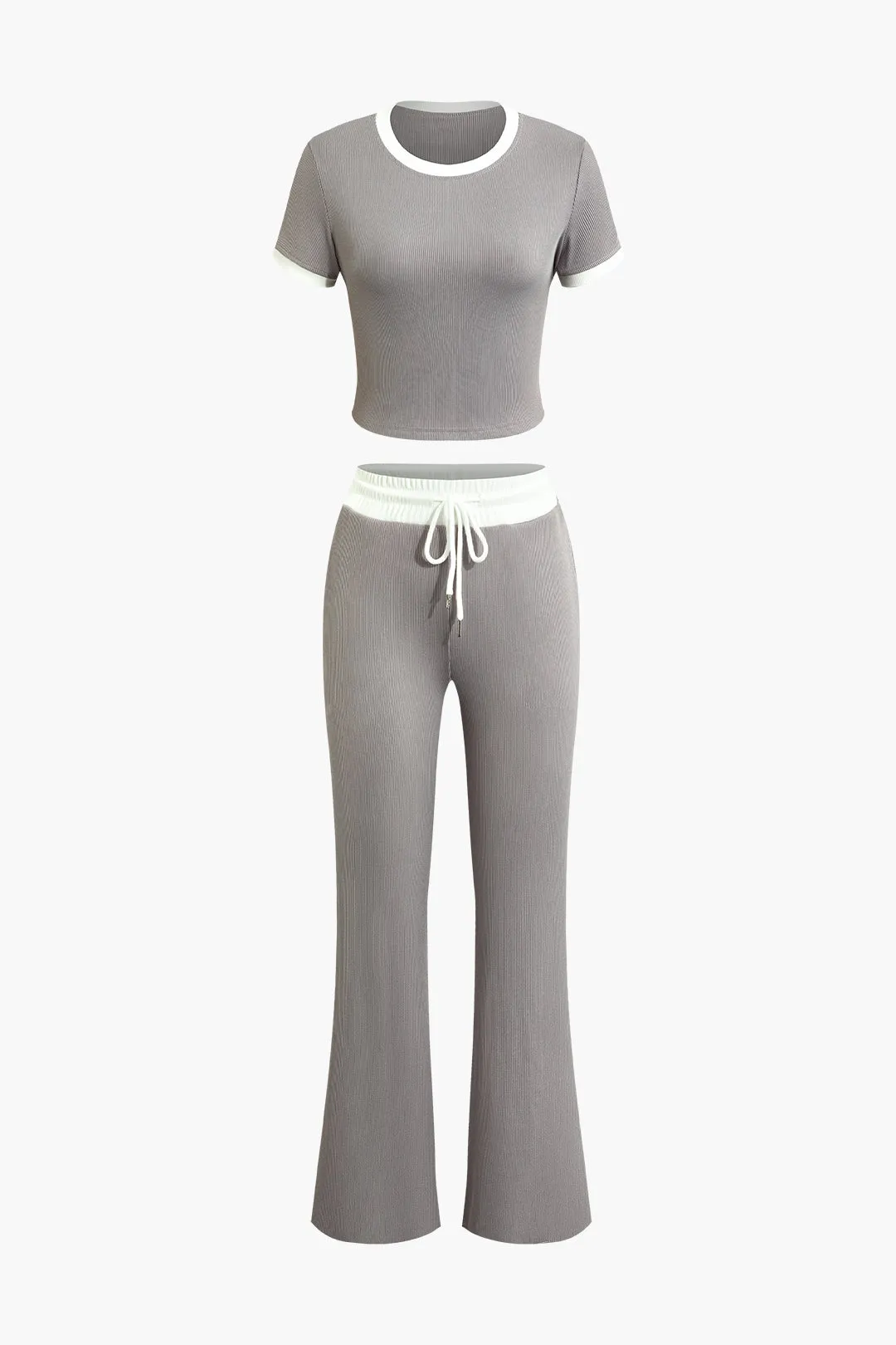 Kontrast kortærmet top og slips foran brede benbukser sæt sold by Micas