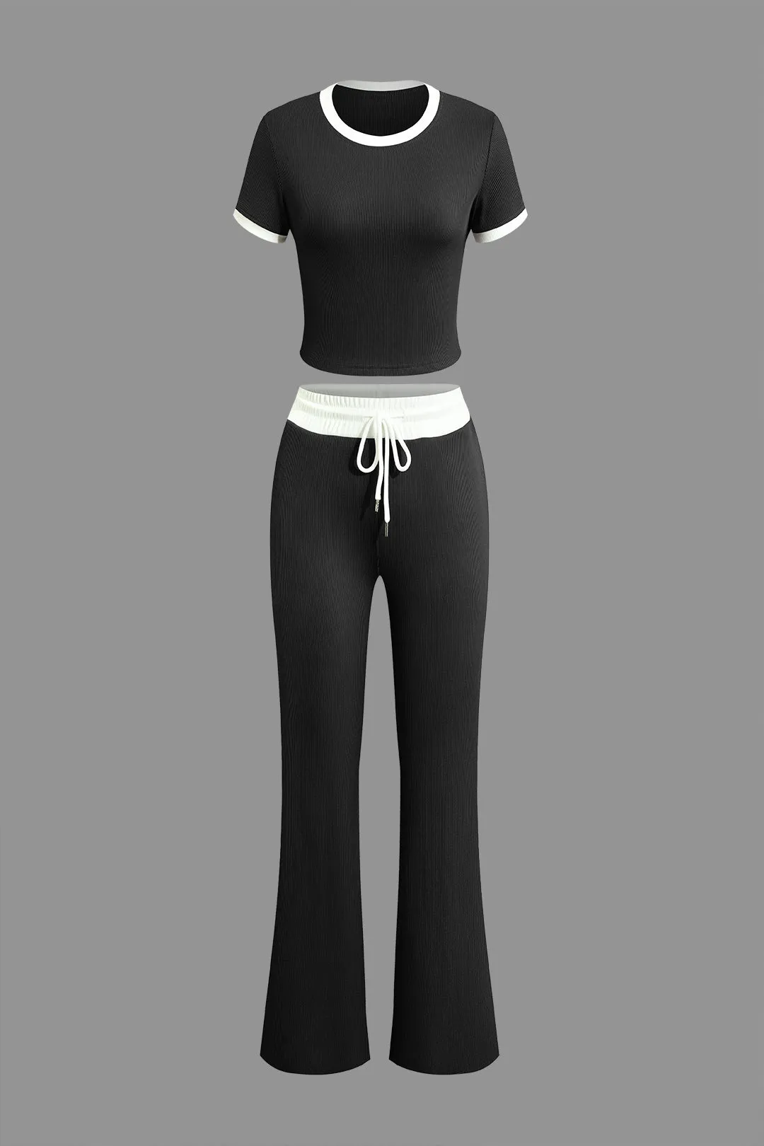 Kontrast kortærmet top og slips foran brede benbukser sæt sold by Micas product image thumbnail 3