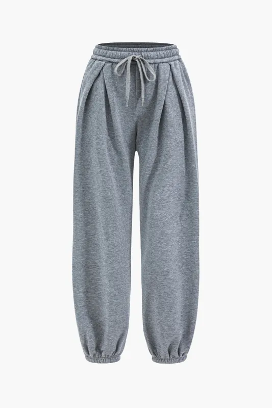 Plisserede slips foran bukser sold by Micas