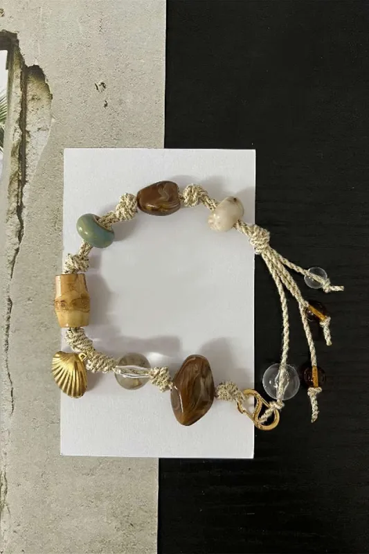 Metallisk vævet armbånd sold by Micas