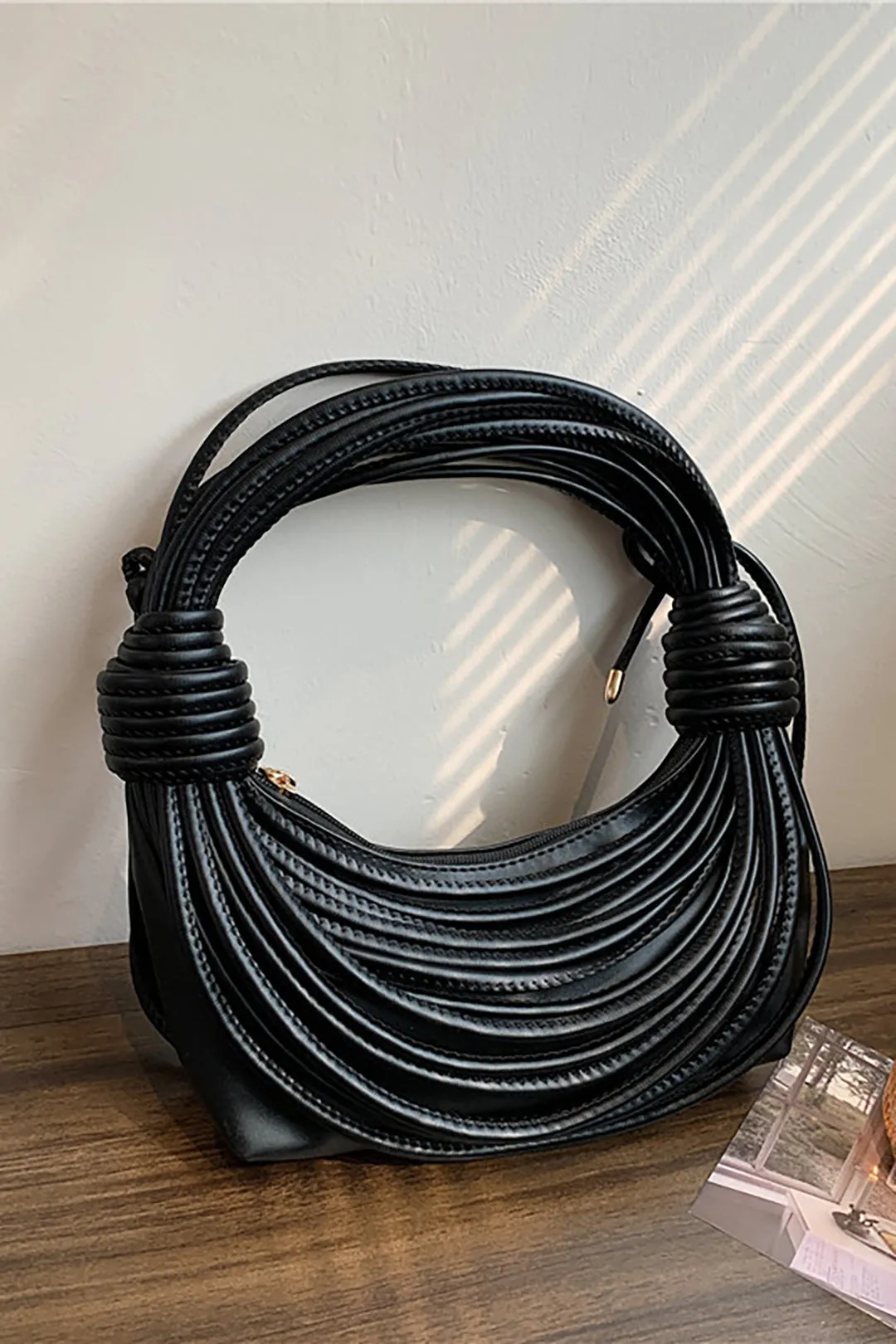 Faux læder vævet lynlås kobling taske sold by Micas product image thumbnail 4