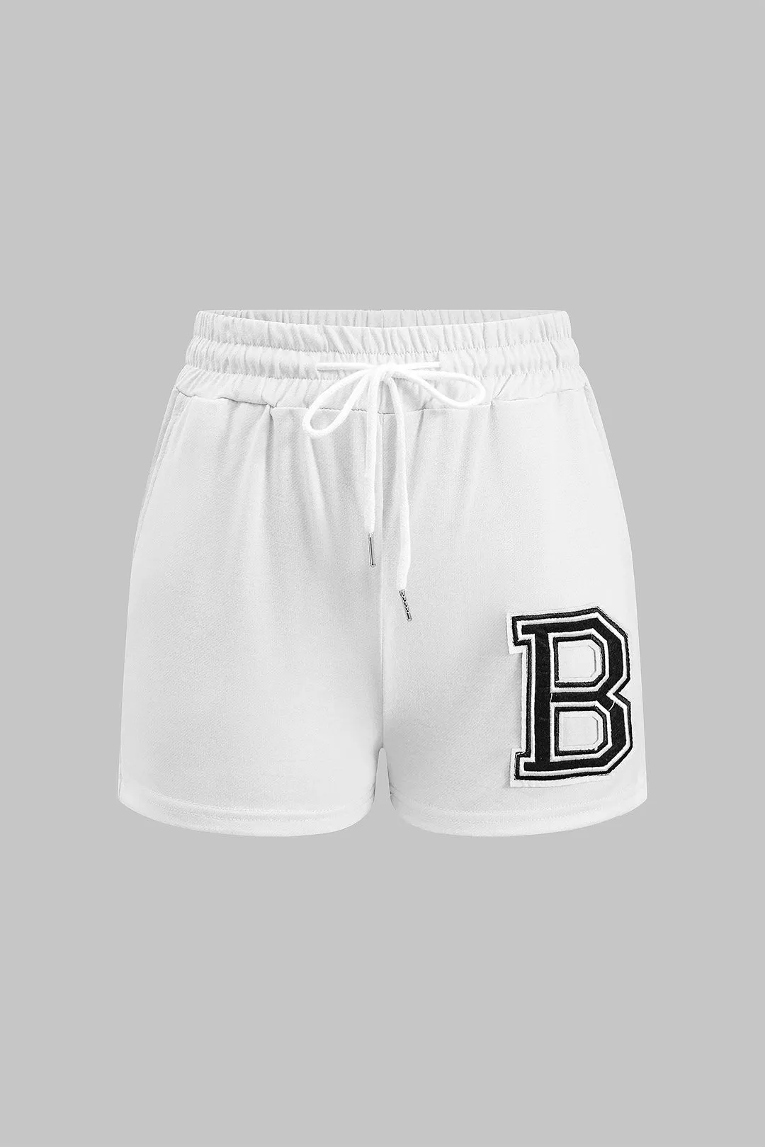 Brevprint hætte lynlås kortærmet top og ruched slips front shorts sæt sold by Micas product image thumbnail 4