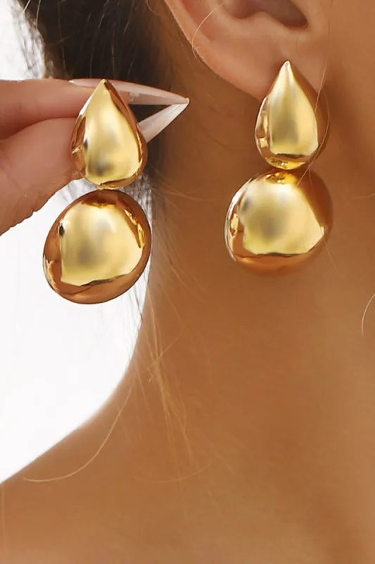 Metal ovale geometriske øreringe sold by Micas