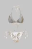 Folieprint udskåret bindingsbikini-sæt sold by Micas