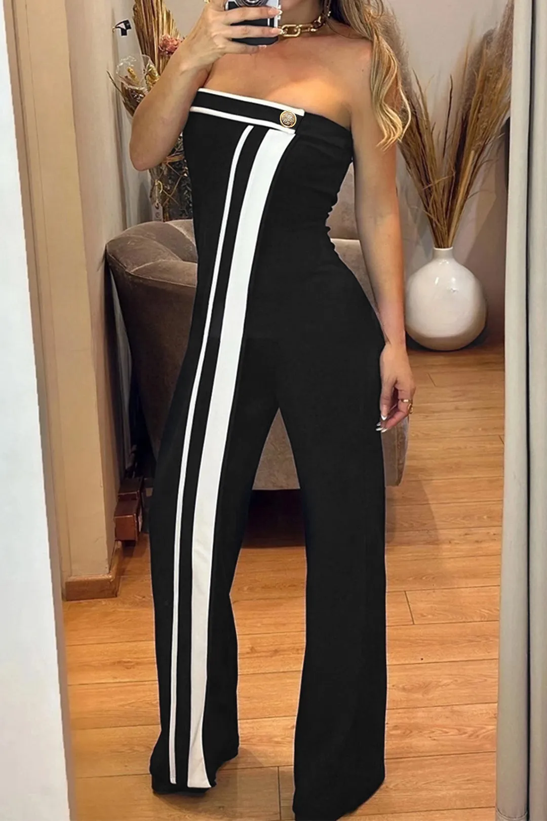 Kontrast asymmetrisk knap Stropløs jumpsuit sold by Micas