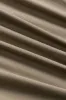 Plisset ruffle slips foran jakke sold by Micas
