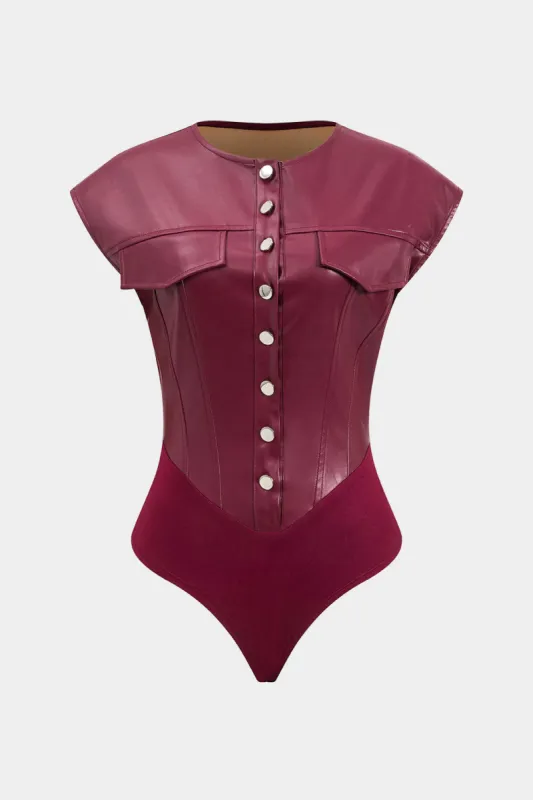 Faux læder knap falske lomme korset bodysuit sold by Micas