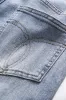 Rippet udskåret knaplomme brede ben jeans sold by Micas